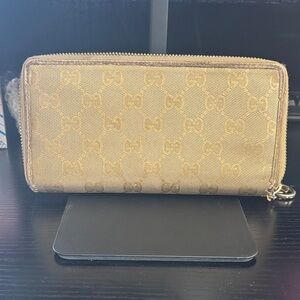 Gucci Beige Monogram Zip Around Wallet Org $550